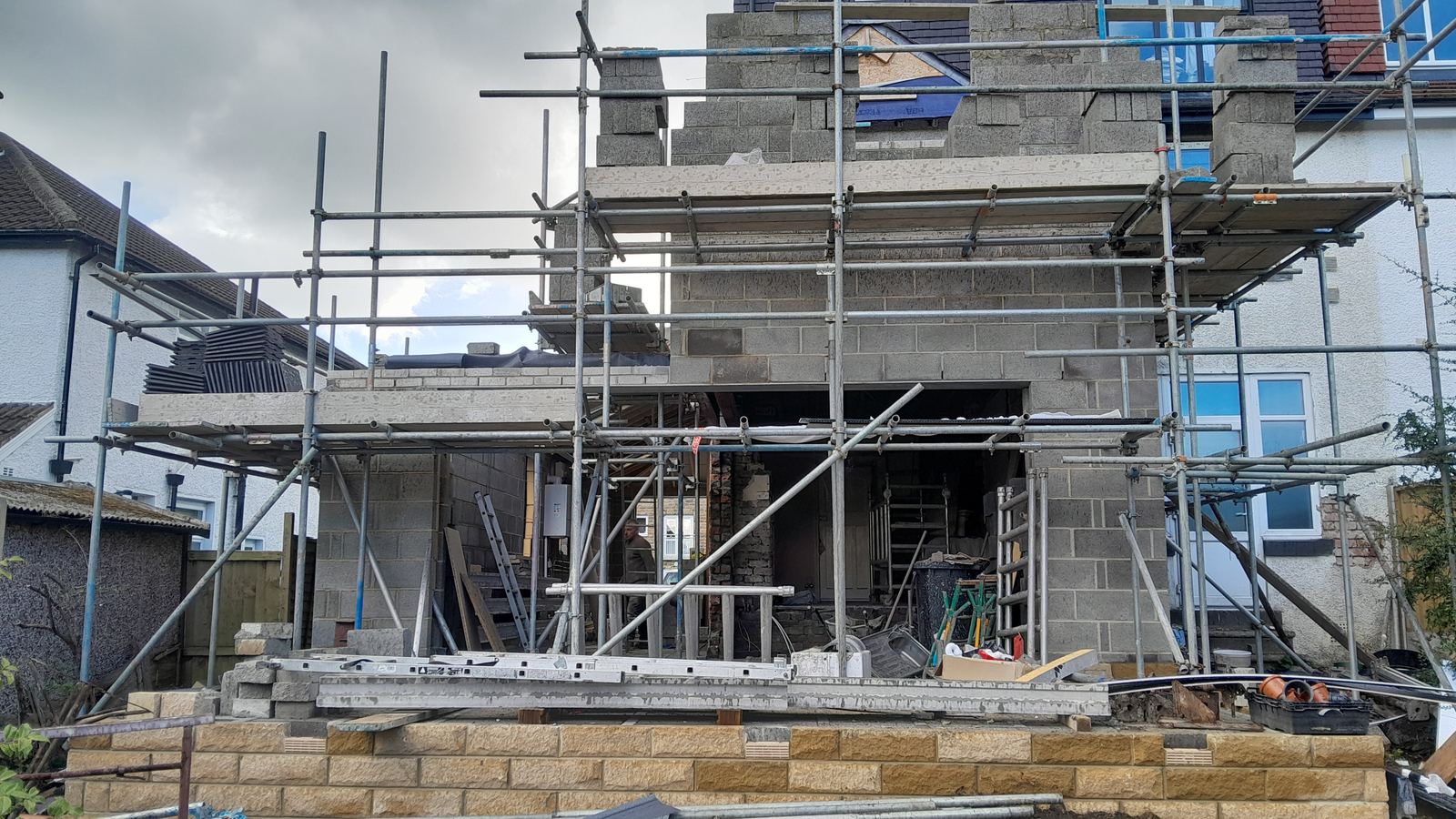 two-storey extension mid-build, scaffold up