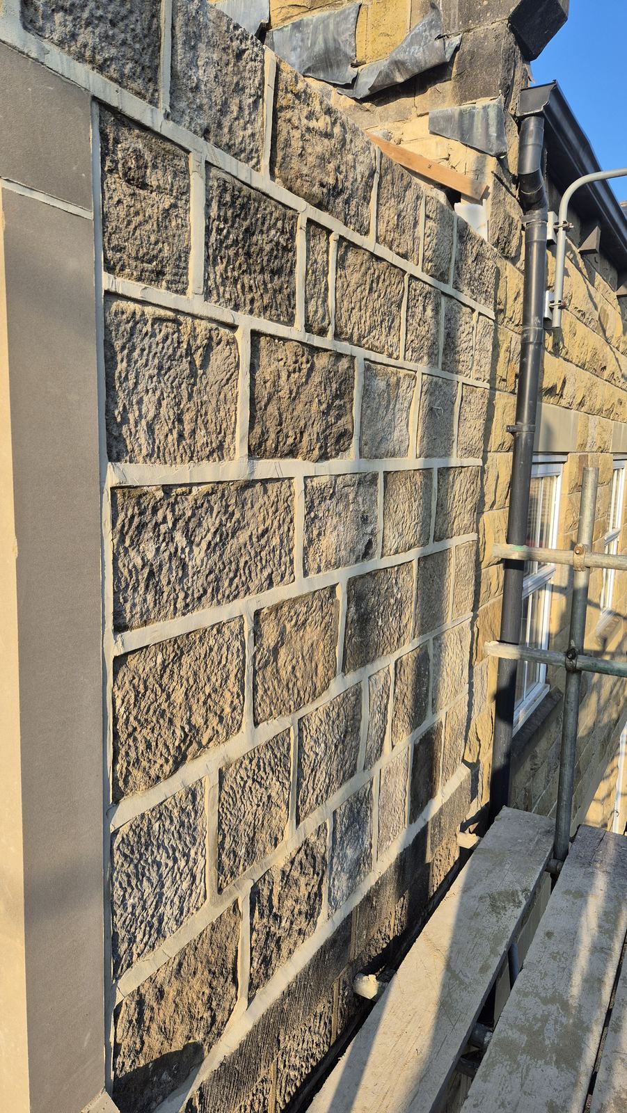rockface coursed stone, newly pointed, close detail