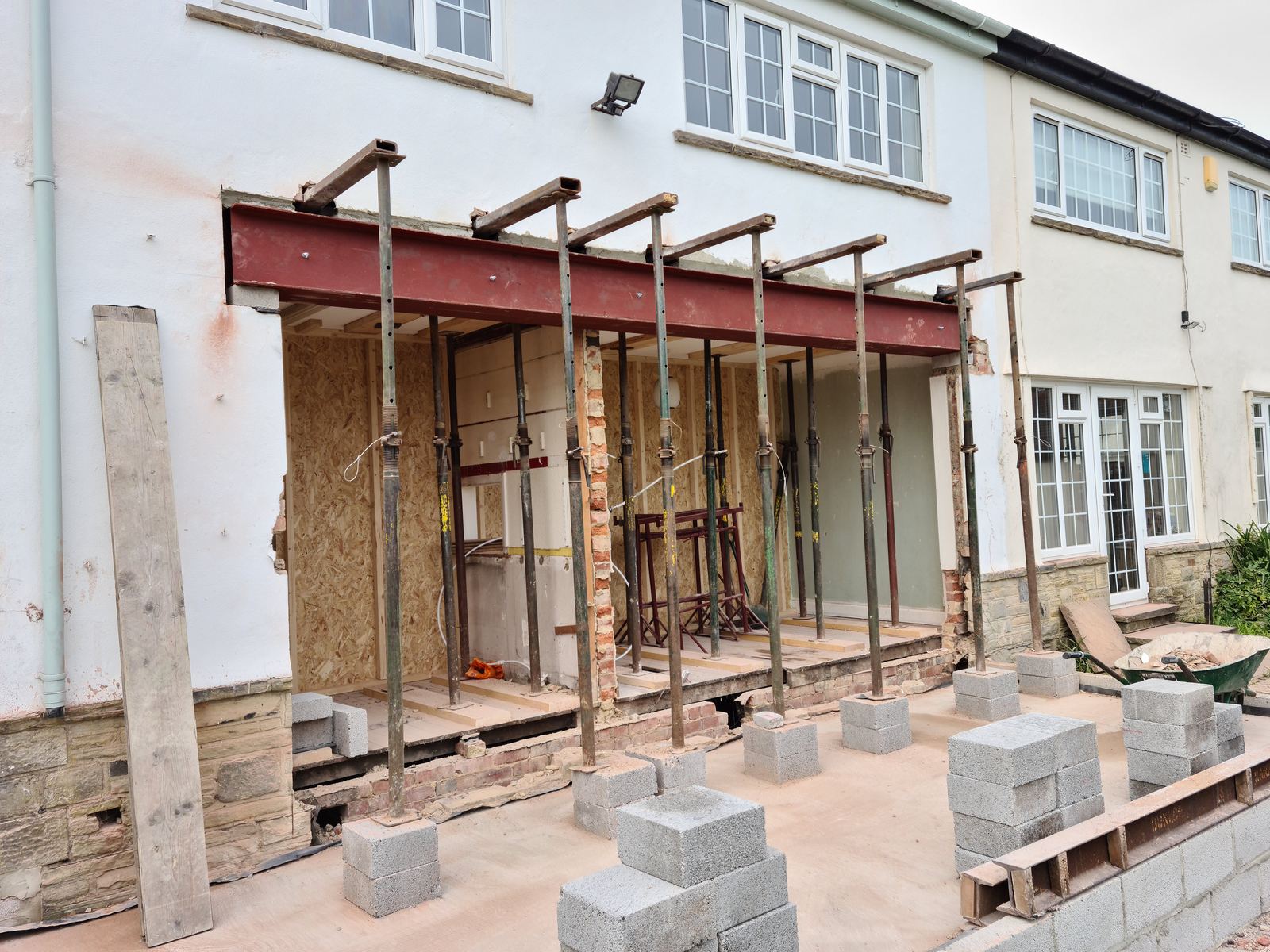 the RSJ down on its padstones, props still in, before the walls close it up