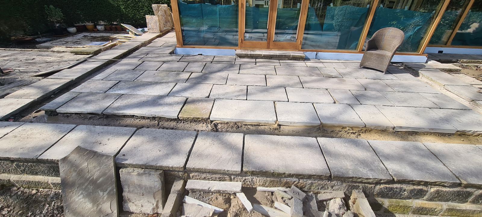 thick riven stone flags, large format, laid across a terrace