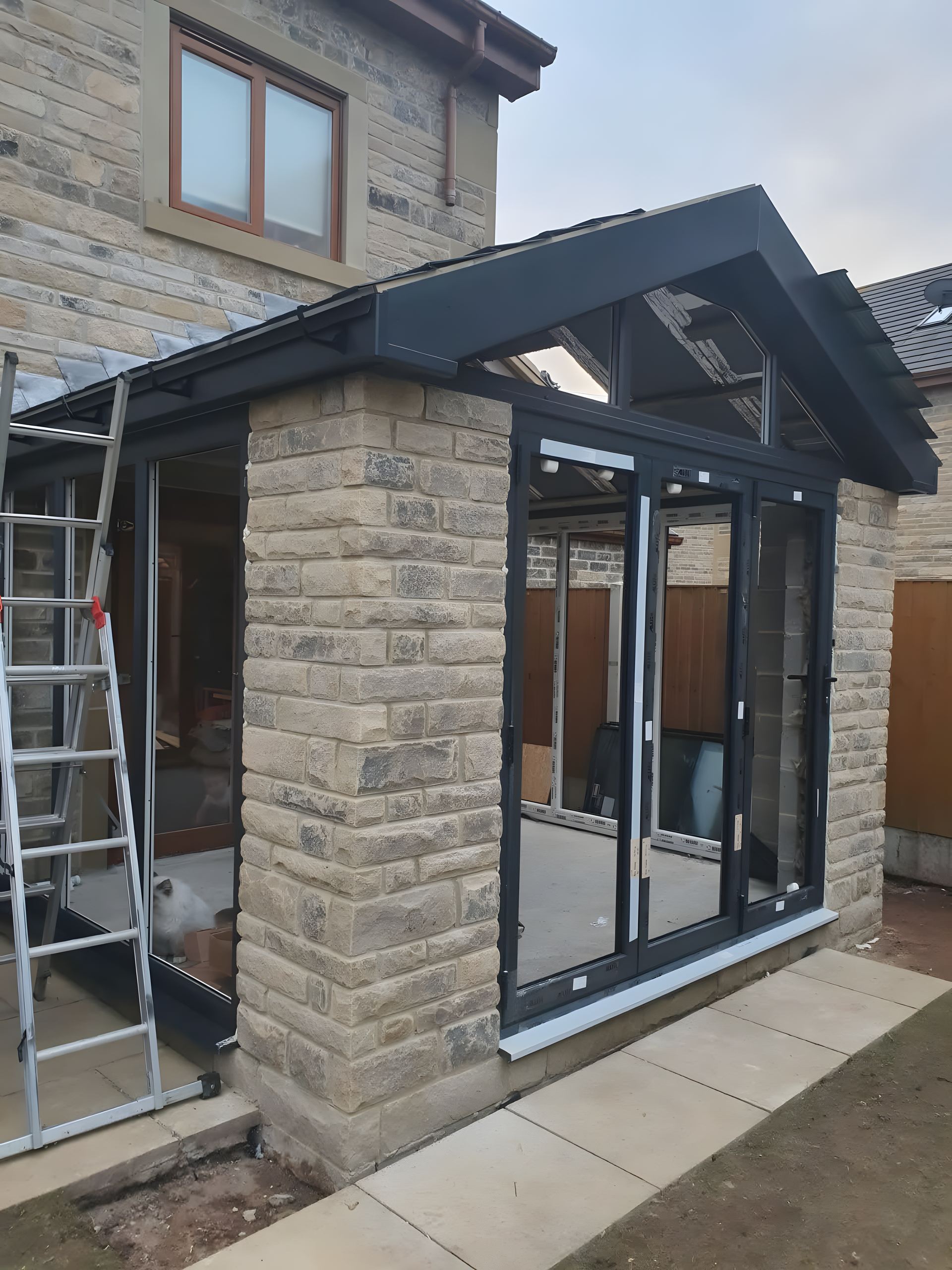 single-storey rear extension finished, wide from the garden