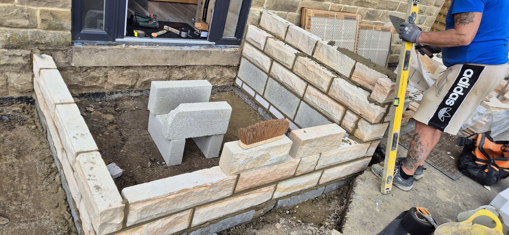 a full brick or stone porch built from the ground up, all masonry