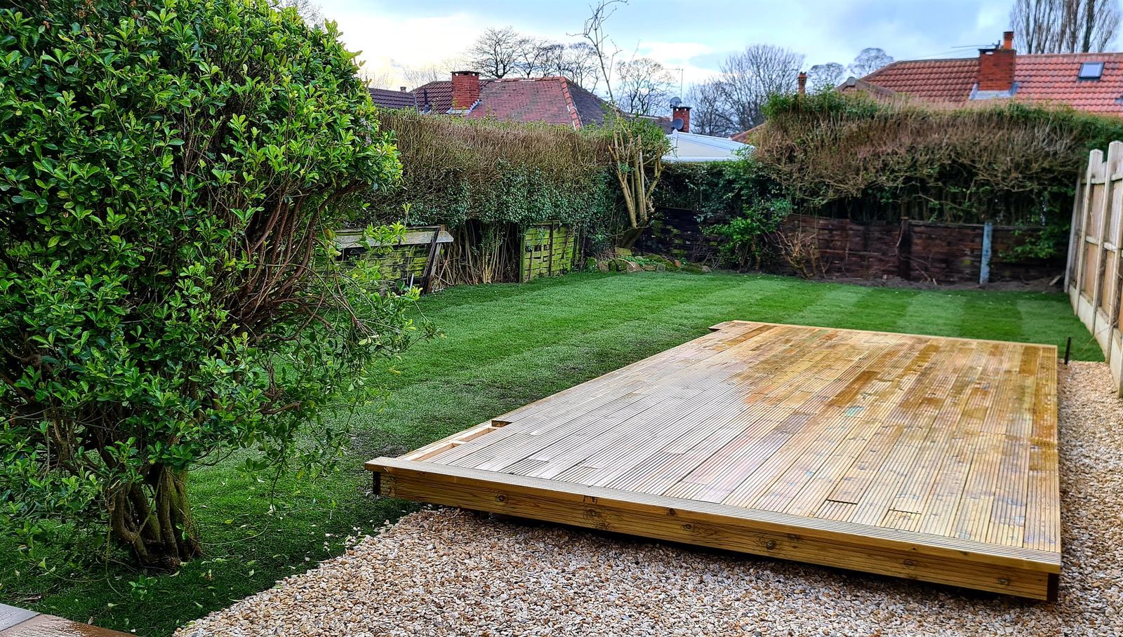 timber deck platform with the new lawn run up to it